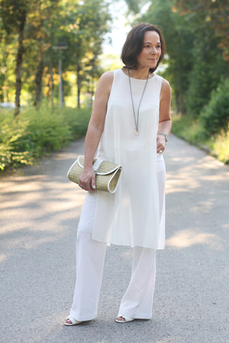 Tan Straw Clutch Outfits: One of the best ways to style a white silk tunic is to team it with a tan straw clutch. If you need to effortlessly bump up your ensemble with footwear, why not complement this look with white leather heeled sandals?