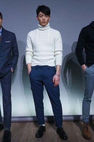 White Knit Wool Turtleneck Outfits For Men: This combo of a white knit wool turtleneck and navy cargo pants is impeccably stylish and yet it's easy enough and ready for anything. To bring out an elegant side of you, throw a pair of black leather derby shoes into the mix.