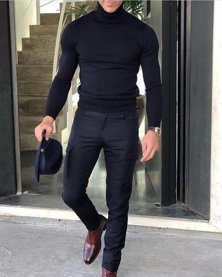 Navy Cargo Pants Outfits: For an ensemble that's very easy but can be modified in a ton of different ways, wear a navy turtleneck and navy cargo pants. Serve a little outfit-mixing magic by sporting a pair of burgundy leather oxford shoes.