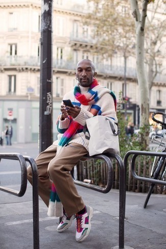 Multi colored Scarf Outfits For Men: If you prefer casual ensembles, why not reach for a white horizontal striped wool turtleneck and a multi colored scarf? To bring an extra dimension to this look, complement this ensemble with multi colored athletic shoes.