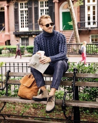 Navy Knit Wool Turtleneck Outfits For Men: Try pairing a navy knit wool turtleneck with navy chinos for an off-duty outfit with a modern finish. Up the ante of your look with a pair of beige suede desert boots.