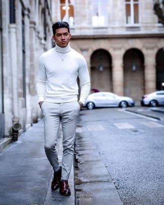 Navy Horizontal Striped Socks Outfits For Men: Marry a white wool turtleneck with navy horizontal striped socks to get a casual street style and absolutely dapper ensemble. Why not add burgundy leather double monks to the mix for a dose of sophistication?