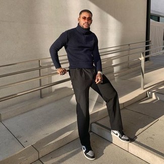 White and Black High Top Sneakers Outfits For Men: For relaxed dressing with a twist, wear a navy knit wool turtleneck and black chinos. Rev up this look by rounding off with white and black high top sneakers.