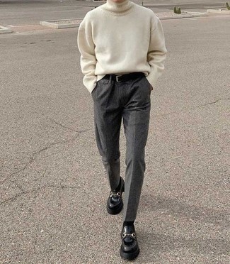 Black Chunky Leather Loafers Outfits For Men: If it's comfort and practicality that you're seeking in an ensemble, marry a beige wool turtleneck with charcoal wool chinos. Why not take a sleeker approach with footwear and finish off with black chunky leather loafers?
