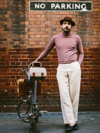 Khaki Linen Chinos Outfits: Marrying a pink turtleneck with khaki linen chinos is a good option for a laid-back yet sharp outfit. If you need to immediately spruce up your outfit with footwear, why not complete your look with navy leather loafers?
