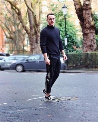 Men's Navy Turtleneck, Navy Chinos, Black and White Canvas Low Top Sneakers, Clear Sunglasses
