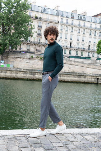 Teal Turtleneck Outfits For Men: If it's comfort and functionality that you're searching for in an ensemble, consider pairing a teal turtleneck with grey chinos. Why not add white leather low top sneakers to the equation for a sense of stylish nonchalance?