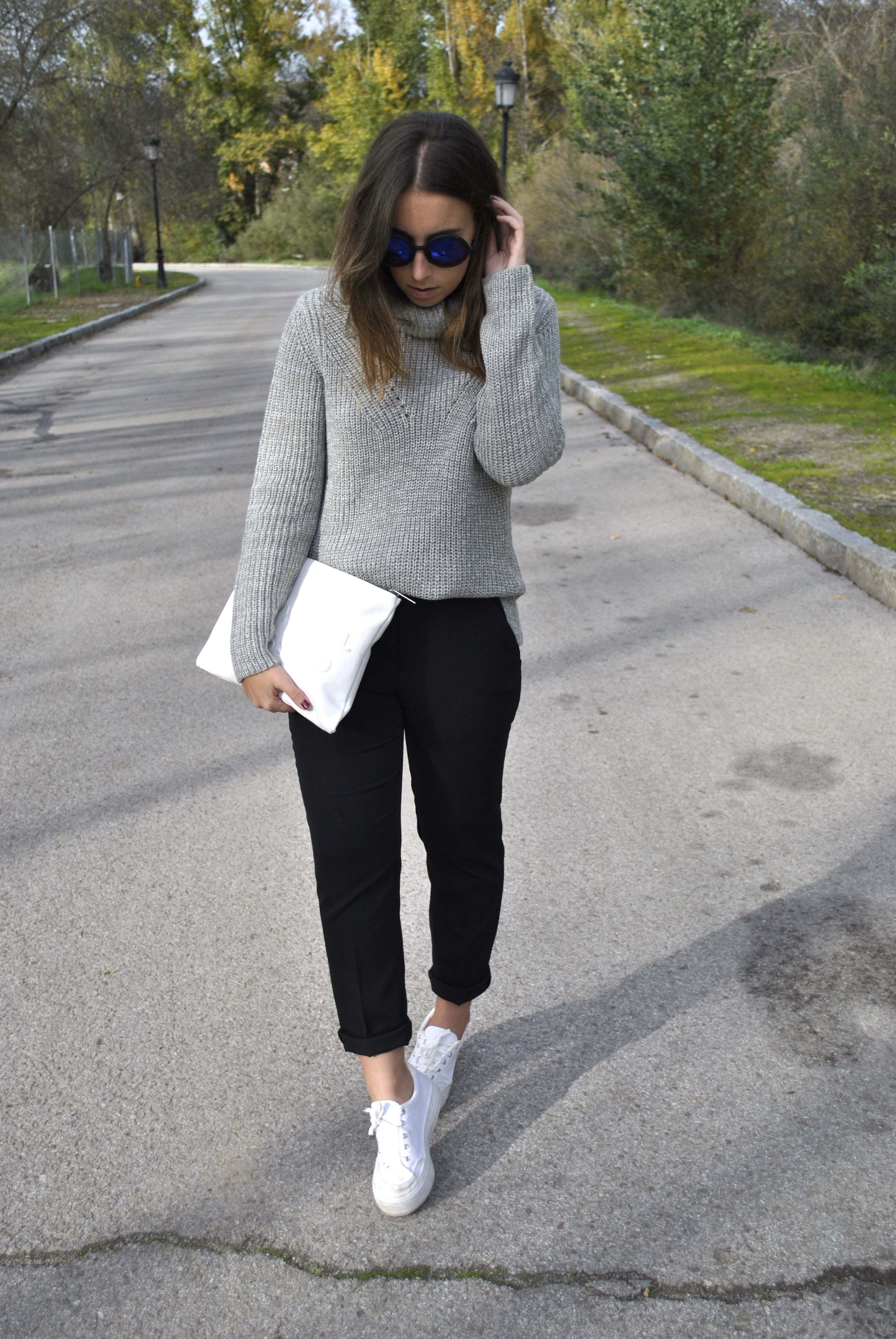 Women's Grey Knit Turtleneck, Black Chinos, White Low Top Sneakers, White  Leather Clutch | Lookastic