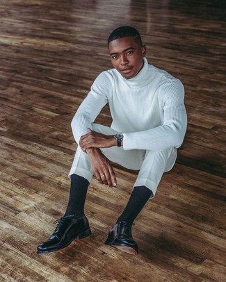 White Knit Wool Turtleneck Outfits For Men: This casual combination of a white knit wool turtleneck and white chinos is a never-failing option when you need to look cool but have zero time to spare. A good pair of black leather oxford shoes is the most effective way to bring an added dose of class to your ensemble.