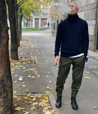 Navy Knit Wool Turtleneck Outfits For Men: A navy knit wool turtleneck and olive chinos are a cool outfit that will carry you throughout the day and into the night. If you wish to effortlessly bump up this look with footwear, make navy leather casual boots your footwear choice.
