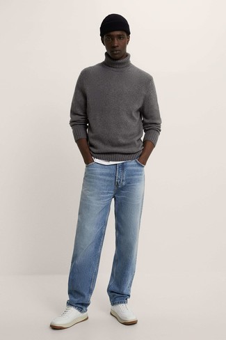 Light Blue Jeans Outfits For Men: This combination of a grey wool turtleneck and light blue jeans will cement your expertise in menswear styling even on weekend days. As for shoes, complete your outfit with a pair of white leather low top sneakers.