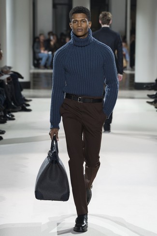 Navy Knit Wool Turtleneck Outfits For Men: You'll be surprised at how super easy it is to get dressed this way. Just a navy knit wool turtleneck paired with dark brown dress pants. A pair of black leather chelsea boots will be the perfect accompaniment for your outfit.