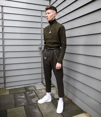 Dark Green Turtleneck Outfits For Men: Make a dark green turtleneck and black dress pants your outfit choice for extra classic attire. Introduce a pair of white leather low top sneakers to this outfit to add an element of stylish effortlessness to this look.