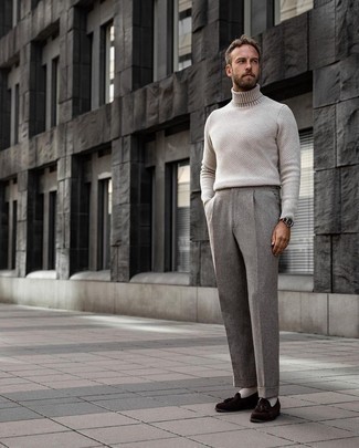 Grey Print Turtleneck Outfits For Men: This combination of a grey print turtleneck and grey dress pants is a surefire option when you need to look like a sharp gentleman. If you wish to instantly up the style ante of your look with one single item, why not complete your look with a pair of dark brown suede tassel loafers?