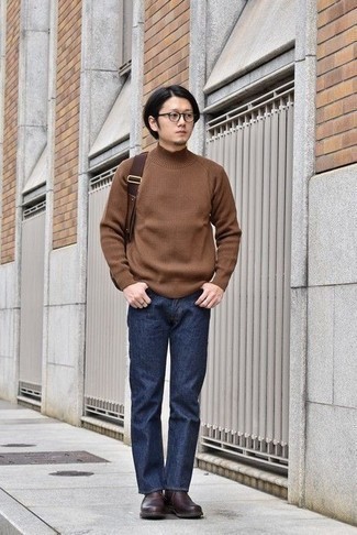 Dark Brown Leather Chelsea Boots Outfits For Men: If you appreciate comfortable menswear, try pairing a brown knit wool turtleneck with navy jeans. For a more elegant touch, why not introduce dark brown leather chelsea boots to this getup?