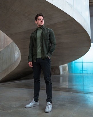 Dark Green Turtleneck Outfits For Men: This combination of a dark green turtleneck and black chinos spells casual cool and comfortable menswear style. Let your sartorial sensibilities truly shine by rounding off this ensemble with a pair of white canvas low top sneakers.