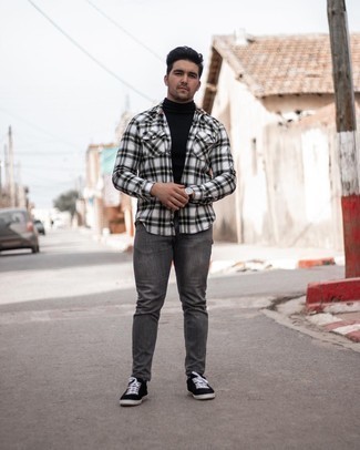 White Plaid Long Sleeve Shirt Outfits For Men: This combo of a white plaid long sleeve shirt and charcoal jeans is the perfect base for an endless number of getups. Black canvas low top sneakers act as the glue that brings your look together.