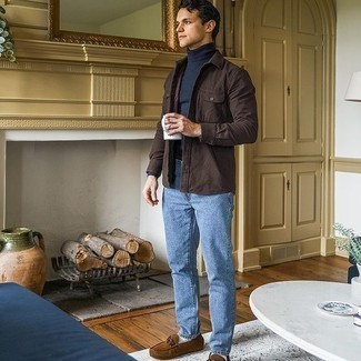 Navy Turtleneck Outfits For Men: If the setting permits a casual ensemble, consider wearing a navy turtleneck and light blue jeans. Brown suede driving shoes are a goofproof footwear option here that's full of character.