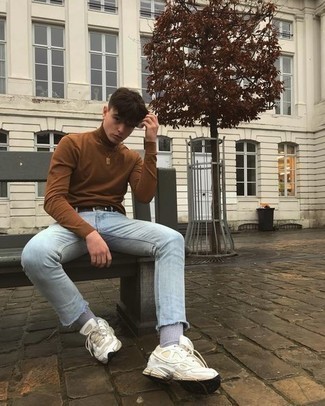White Athletic Shoes Outfits For Men: You'll be amazed at how easy it is for any gentleman to put together this laid-back getup. Just a brown turtleneck teamed with light blue skinny jeans. A pair of white athletic shoes will easily play down a dressy getup.