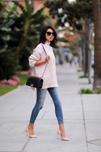 Hot Pink Leather Pumps Outfits: Extremely chic, this combo of a pink knit turtleneck and blue ripped skinny jeans provides with variety. Hot pink leather pumps are a fail-safe way to bring a sense of polish to your outfit.