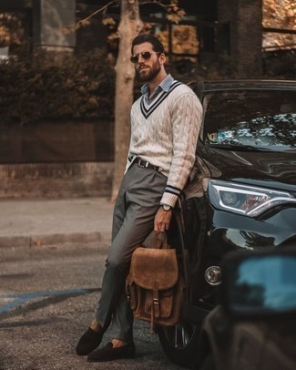 Brown Suede Backpack Outfits For Men: You'll be surprised at how easy it is for any gent to put together a city casual outfit like this. Just a beige v-neck sweater matched with a brown suede backpack. For a more elegant vibe, why not complement this look with dark brown suede loafers?