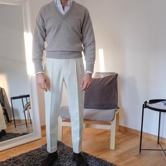 Tan V-neck Sweater Outfits For Men: For an outfit that's polished and Kingsman-worthy, pair a tan v-neck sweater with white dress pants. Dark brown suede loafers look perfect here.