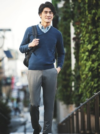 V-neck Sweater Outfits For Men: This combo of a v-neck sweater and grey chinos is on the off-duty side but guarantees that you look seriously stylish and seriously sharp. Our favorite of a myriad of ways to complete this look is a pair of black leather loafers.