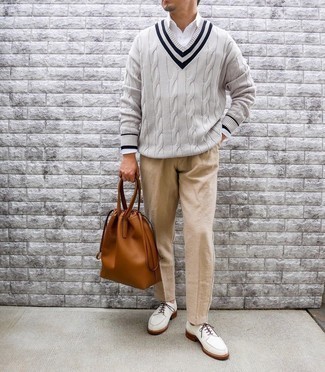 White Suede Derby Shoes Outfits: Consider pairing a grey v-neck sweater with khaki chinos for relaxed dressing with a contemporary spin. Amp up this whole outfit with white suede derby shoes.