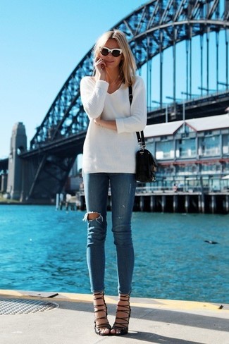 V-neck Sweater Outfits For Women: A v-neck sweater and blue ripped skinny jeans are the kind of chic casual pieces that you can wear for years to come. Add black suede heeled sandals to the equation to make the look slightly more elegant.