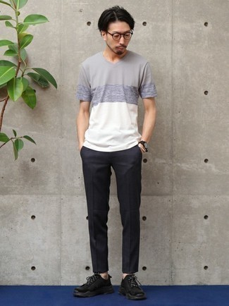 Black Chinos Summer Outfits: This casual combination of a multi colored v-neck t-shirt and black chinos comes to rescue when you need to look great in a flash. Jazz up this outfit by rocking black athletic shoes. If you're trying to figure out a summer-ready outfit, this one is a wonderful choice.