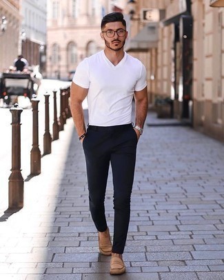 White V-neck T-shirt Outfits For Men: This relaxed casual pairing of a white v-neck t-shirt and navy chinos can only be described as outrageously sharp. And if you want to instantly spruce up this outfit with one piece, why not complete your look with a pair of tan suede loafers?
