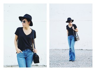 Blue Flare Jeans Outfits: A black v-neck t-shirt and blue flare jeans are the kind of stylish casual items that you can wear for years to come.