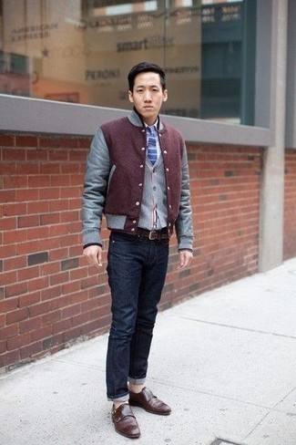 Dark Brown Leather Double Monks Fall Outfits: For an ensemble that's extremely easy but can be styled in many different ways, consider pairing a burgundy varsity jacket with navy jeans. If you want to feel a bit more sophisticated now, complement this getup with dark brown leather double monks. As the mercury drops, you'll see that an outfit like this is perfect for fall.