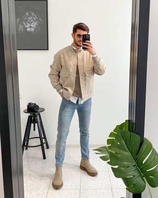 Beige Crew-neck Sweater Outfits For Men: Putting together a beige crew-neck sweater with light blue jeans is an awesome pick for a casually cool ensemble. Make your ensemble a bit sleeker by finishing off with beige suede chelsea boots.