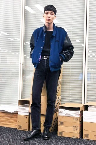 Navy Varsity Jacket Outfits For Men: This pairing of a navy varsity jacket and black chinos is an excellent idea for when it's time to clock off. Rev up the classiness of your look a bit by sporting black leather casual boots.