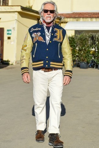 Navy and White Varsity Jacket Outfits For Men: When you need to feel confident in your outfit, wear a navy and white varsity jacket and white chinos. If you don't want to go all out formal, introduce a pair of dark brown suede work boots to the mix.