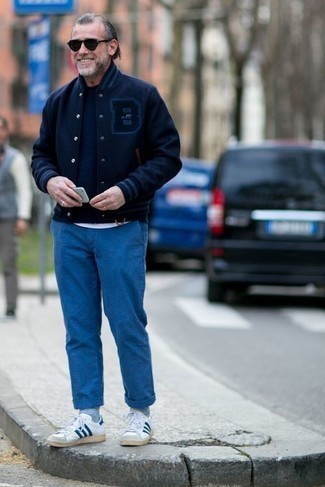 Men's Navy Varsity Jacket, Navy Crew-neck T-shirt, Blue Chinos, White and Navy Leather Low Top Sneakers