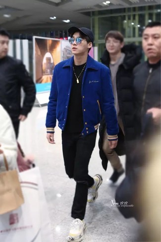 Blue Varsity Jacket Outfits For Men: This look with a blue varsity jacket and black ripped jeans isn't a hard one to score and is easy to change. If you're puzzled as to how to round off, a pair of white athletic shoes is a nice idea.