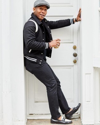 Black and White Varsity Jacket Outfits For Men: You'll be surprised at how super easy it is for any gentleman to put together this laid-back look. Just a black and white varsity jacket paired with black jeans. Finishing off with black and white leather loafers is a simple way to introduce some extra definition to your ensemble.