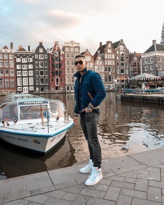 White and Black Print Canvas High Top Sneakers Outfits For Men: The go-to for casual menswear style? A navy varsity jacket with charcoal ripped jeans. If you're clueless about how to finish off, a pair of white and black print canvas high top sneakers is a good pick.