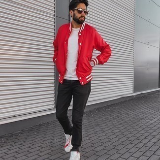 Red Jacket Outfits For Men: This combination of a red jacket and black jeans is hard proof that a safe casual getup doesn't have to be boring. This ensemble is rounded off wonderfully with a pair of white canvas low top sneakers.