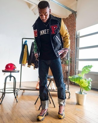 Varsity Jacket Relaxed Outfits For Men: Try pairing a varsity jacket with navy jeans for a hassle-free outfit that's also pulled together. Complement this ensemble with multi colored athletic shoes to keep the ensemble fresh.