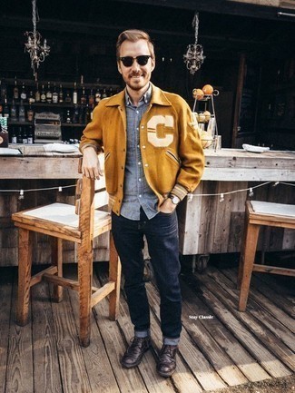 Mustard Varsity Jacket Outfits For Men: Why not consider wearing a mustard varsity jacket and navy jeans? As well as super functional, both of these items look good teamed together. Dark brown leather brogue boots are the most effective way to add a confident kick to the getup.