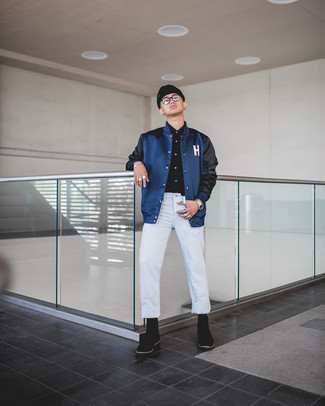 White Ripped Jeans Outfits For Men: We all want functionality when it comes to fashion, and this contemporary combination of a navy varsity jacket and white ripped jeans is a practical example of that. You could perhaps get a little creative in the shoe department and lift up your look by sporting a pair of black suede chelsea boots.
