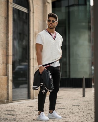 White Sweater Vest Outfits For Men: Choose a white sweater vest and black skinny jeans to put together a neat and relaxed outfit. For a more laid-back aesthetic, complete this outfit with white athletic shoes.