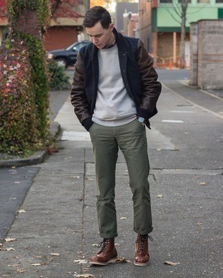 Black Varsity Jacket Outfits For Men: Reach for a black varsity jacket and olive chinos to put together a really sharp and current off-duty outfit. To introduce a little flair to your outfit, introduce dark brown leather casual boots to the equation.