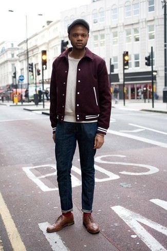 Red and White Varsity Jacket Outfits For Men: Pair a red and white varsity jacket with navy jeans for a casual and trendy outfit. If you wish to easily lift up your outfit with shoes, why not complement your outfit with brown leather brogues?