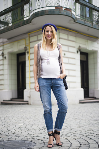 Blue Boyfriend Jeans Outfits: If you’re a jeans-and-a-tee kind of gal, you'll like this simple pairing of a grey vest and blue boyfriend jeans. For a dressier vibe, introduce a pair of black suede heeled sandals to your ensemble.
