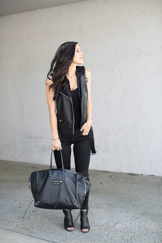 Black Vest Outfits For Women: This combination of a black vest and black skinny jeans is hard proof that a safe casual getup can still look stylish. Hesitant about how to finish off? Complement this outfit with a pair of black cutout leather ankle boots to dial up the wow factor.