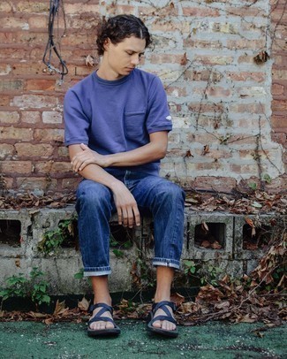 Sandals Outfits For Men: This combo of a violet crew-neck t-shirt and navy jeans delivers comfort and relaxed dapperness. For something more on the daring side to complement your look, introduce a pair of sandals to your outfit.